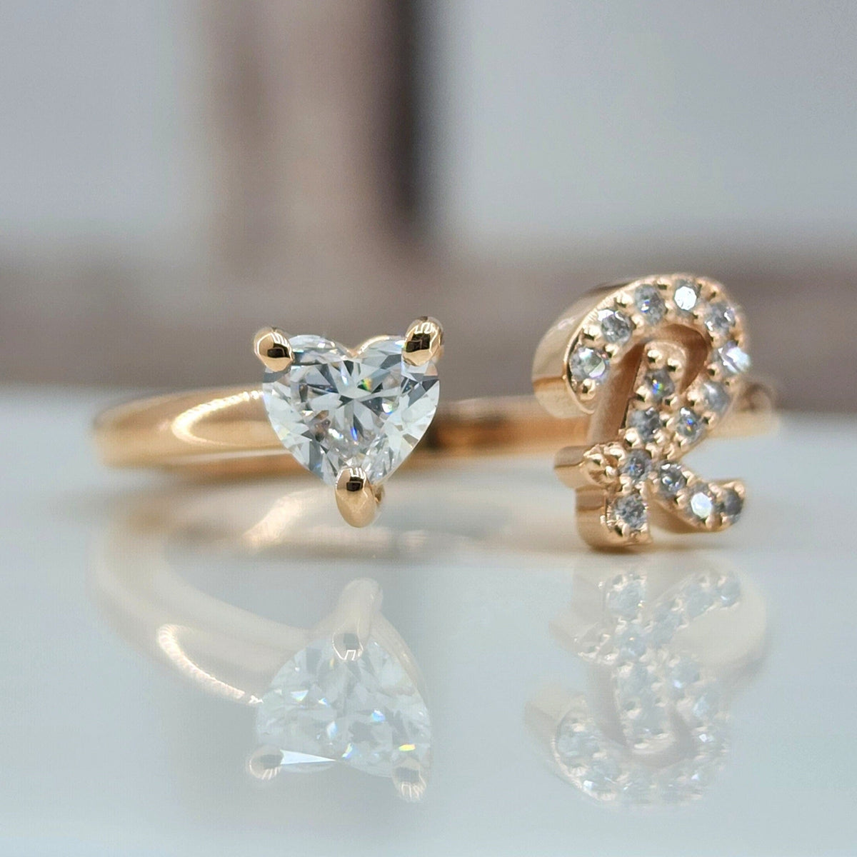 An Open Ring Heart-Shaped Diamond On One Side, Other Side a Letter Of Your Choice Set With Diamonds, Pinky Ring, A Designed And Unique Ring.